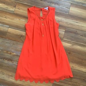 Scalloped bottom sleeveless dress